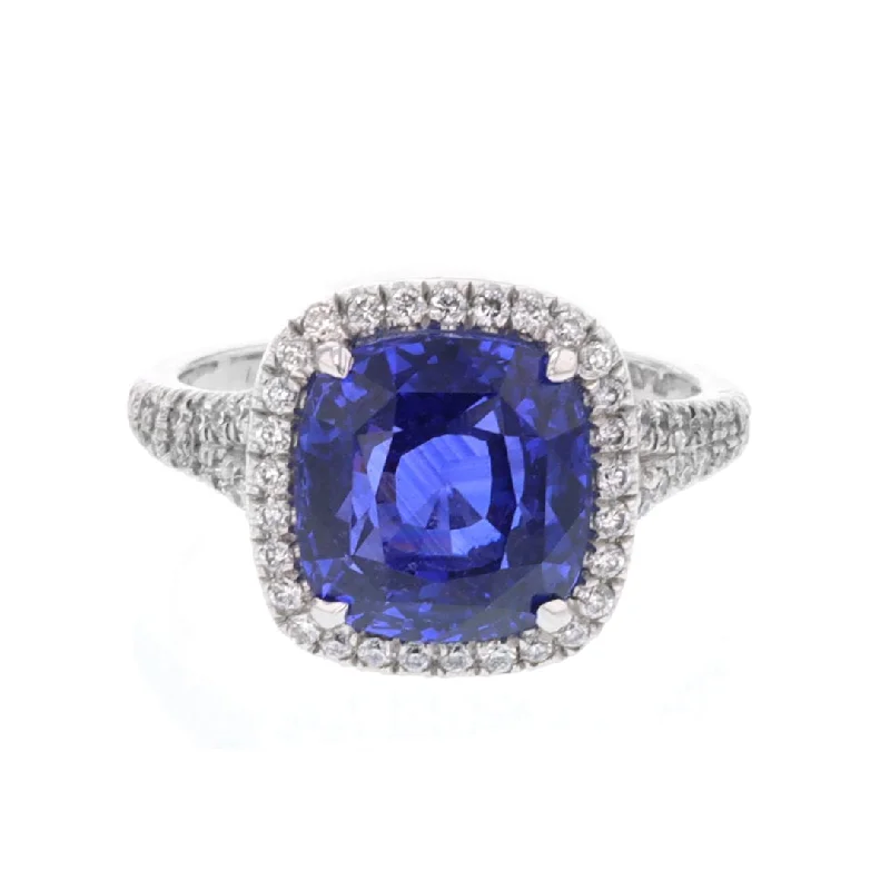 best statement necklaces for women -Blue Sapphire with Diamond Halo Ring